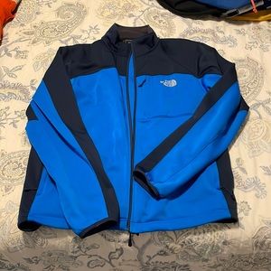 Blue and black northface cover jacket size XL
